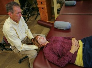 A Patient Receiving Back and Neck Therapy